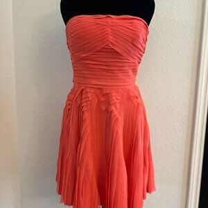 BeBe Coral fringe-pleated strapless cocktail dress, $50 Size 2